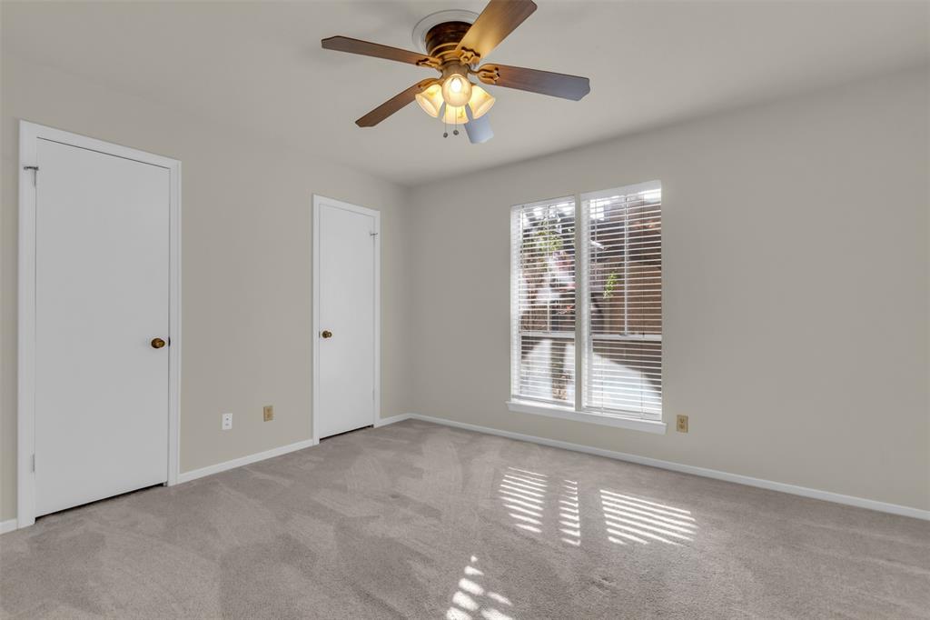 10763 Villager Road, Unit A Dallas, TX 75230 - Photo 15 of 21 a view of an empty room with a window