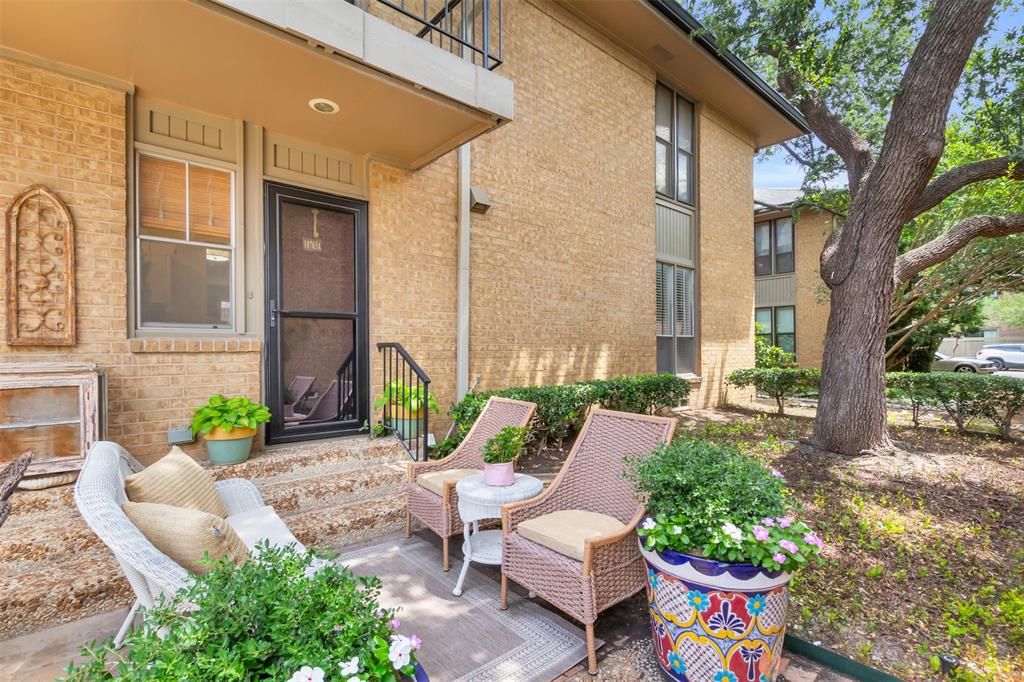 10763 Villager Road, Unit A Dallas, TX 75230 - Photo 18 of 21 a view of a patio with couches table and chairs and potted plants