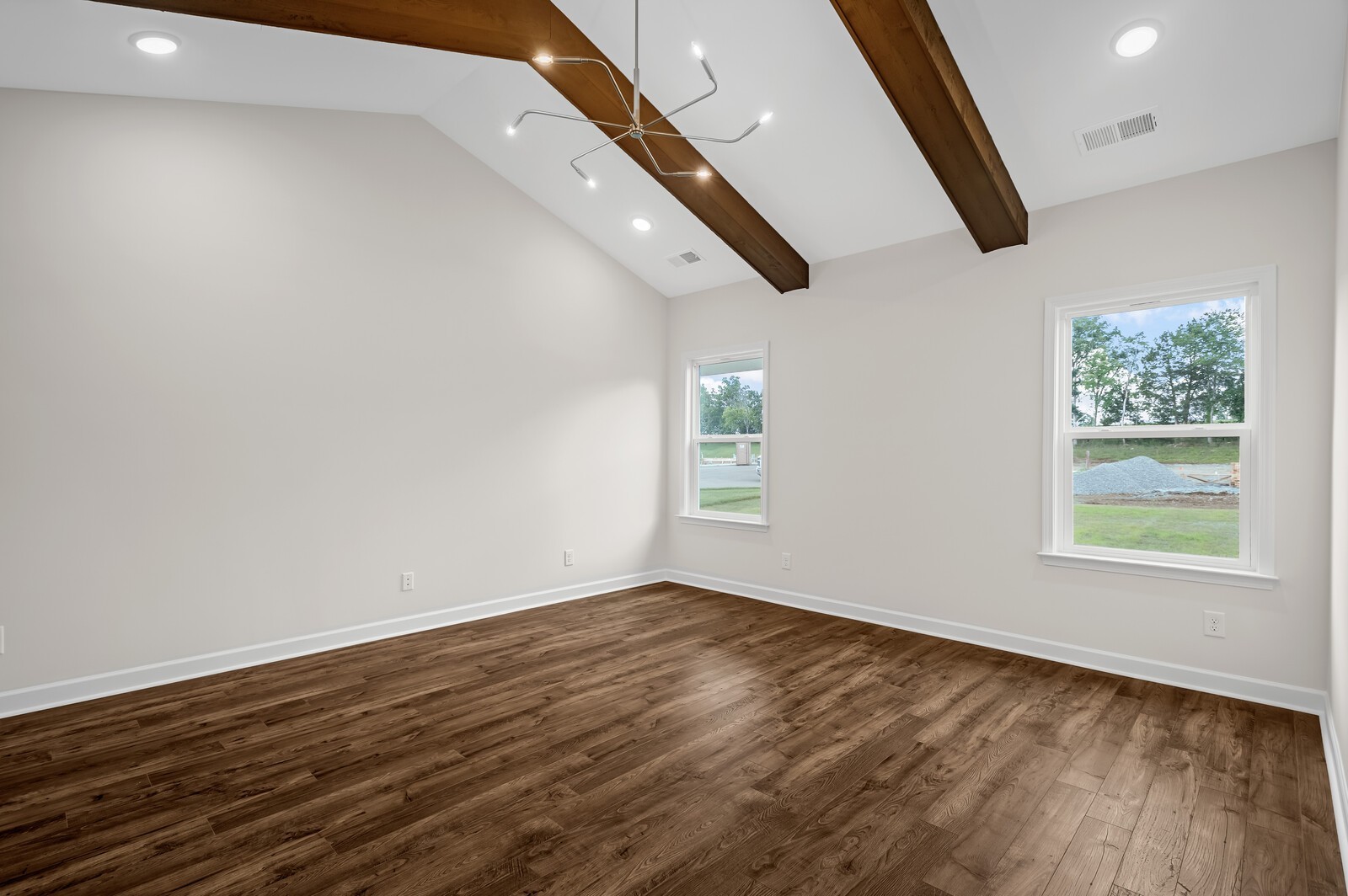 1733 Merkel Road Columbia, TN 38401 - Photo 31 of 53 an empty room with wooden floor cabinet and windows