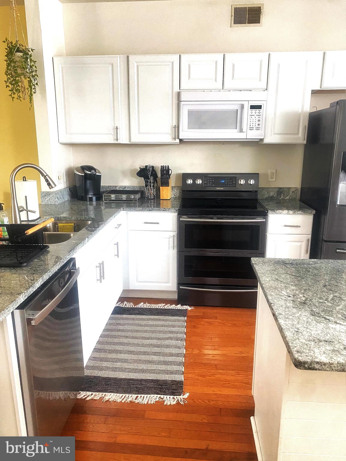 23539 Devonshire Road, Unit 75 Millsboro, DE 19966 - Photo 5 of 16 Kitchen w/Granite Countertops