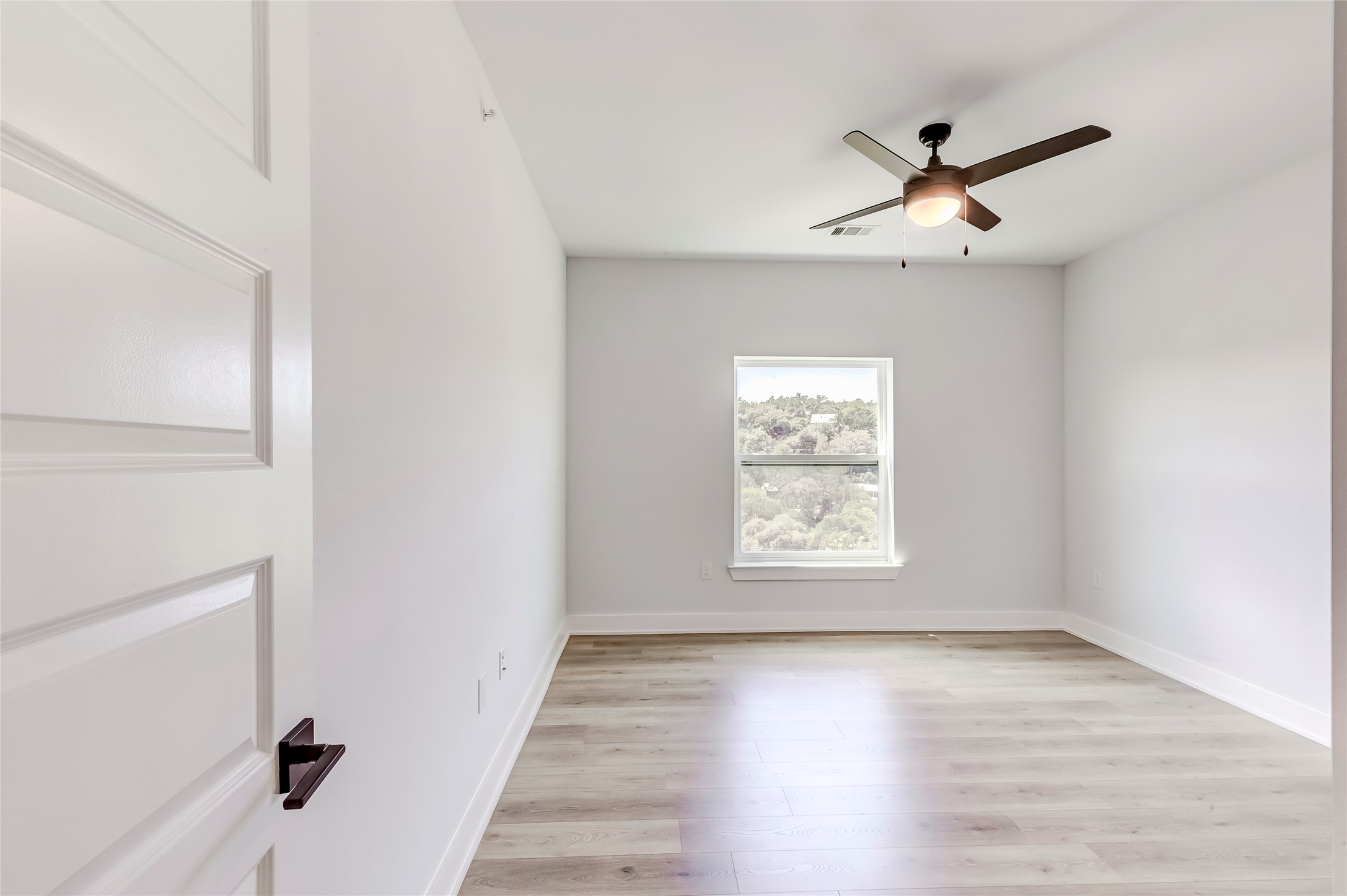 2500 Longview Street, Unit 402 Austin, TX 78705 - Photo 20 of 27 a view of an empty room with a window