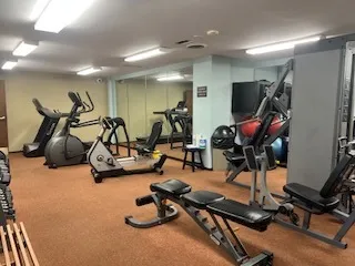 a view of a room with gym equipment