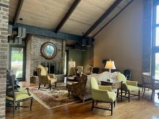 a living room with a couch and a table