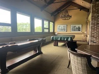 a view of a garden with a house