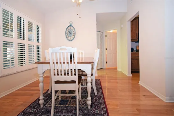 a view of a big room with furniture window and wooden floor
