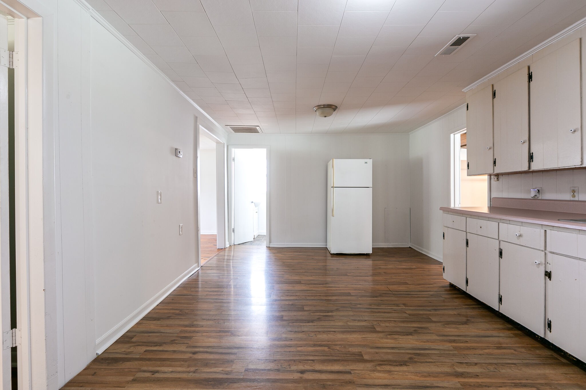 210 Old Rover Road Rockvale, TN 37153 - Photo 12 of 41 a view of a kitchen with wooden floor and cabinets