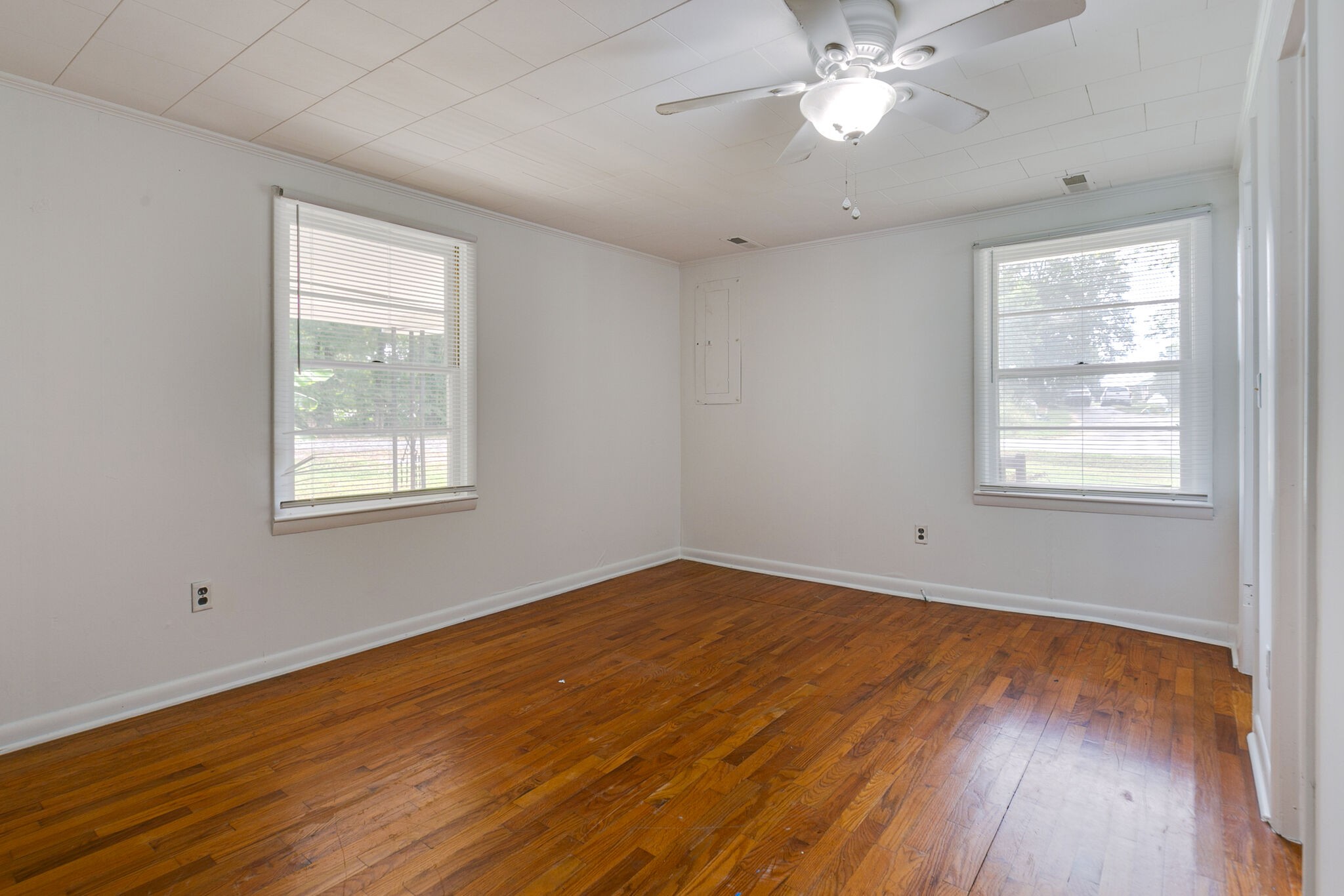 210 Old Rover Road Rockvale, TN 37153 - Photo 14 of 41 a view of an empty room with wooden floor and a window