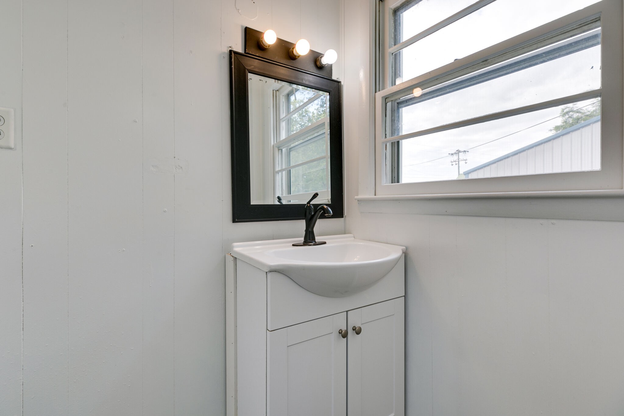 210 Old Rover Road Rockvale, TN 37153 - Photo 19 of 41 a bathroom with a sink and a mirror
