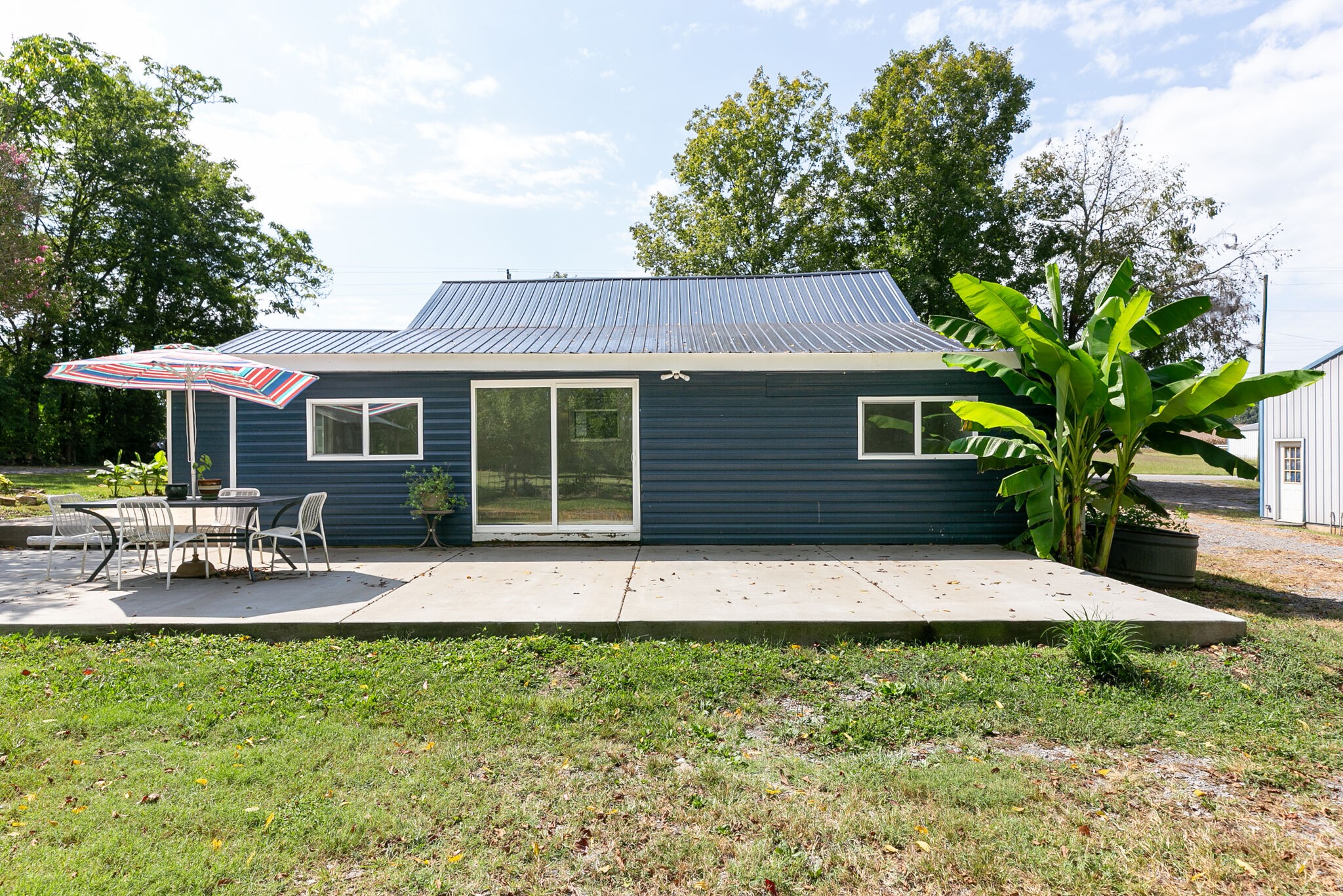 210 Old Rover Road Rockvale, TN 37153 - Photo 37 of 41 a front view of a house with a garden and patio