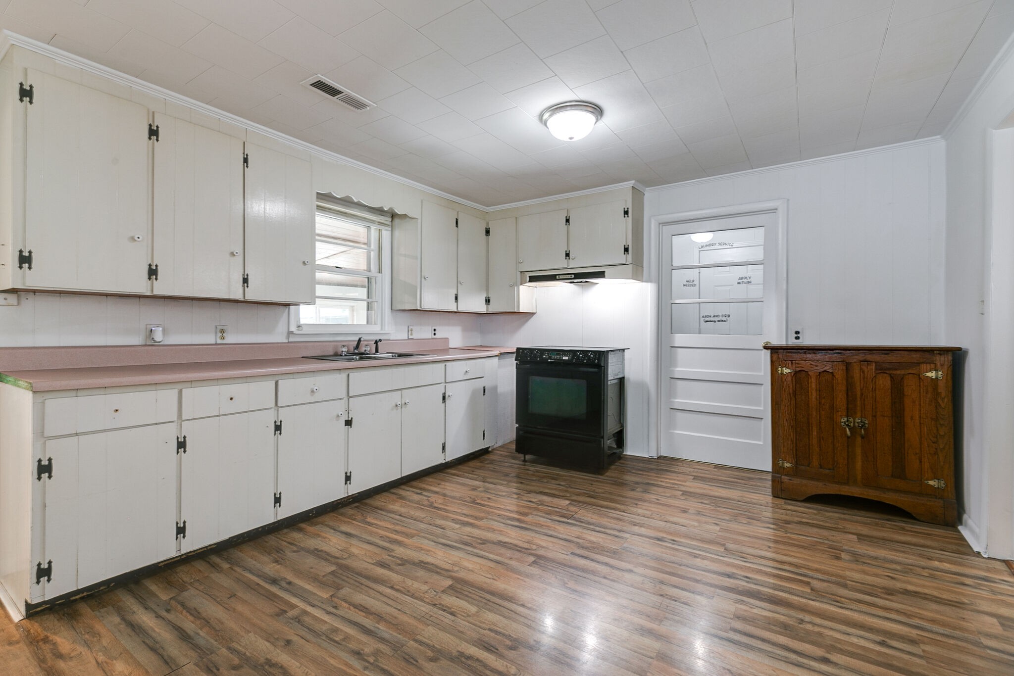 210 Old Rover Road Rockvale, TN 37153 - Photo 10 of 41 a kitchen with granite countertop white cabinets and white appliances
