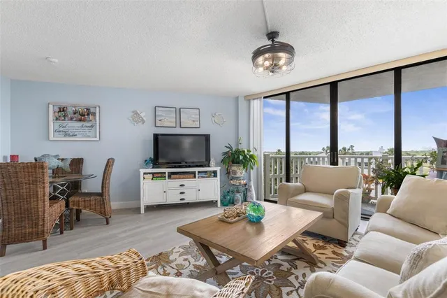 a kitchen with a sink stove top oven and cabinets