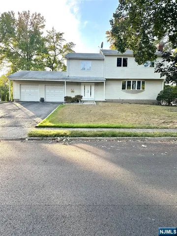 a view of house with outdoor space and street view