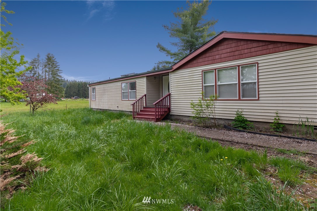 440 Kirkland Road Chehalis, WA 98532 - Photo 27 of 36 a front view of house with yard and green space