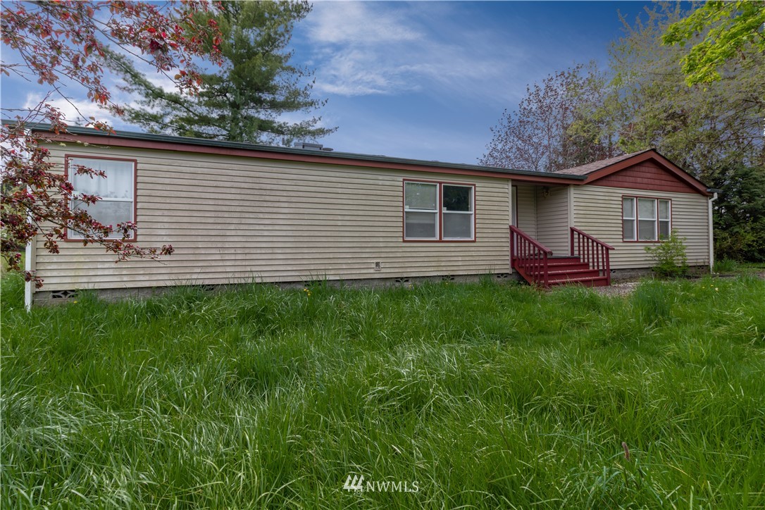 440 Kirkland Road Chehalis, WA 98532 - Photo 28 of 36 a view of a house with a backyard
