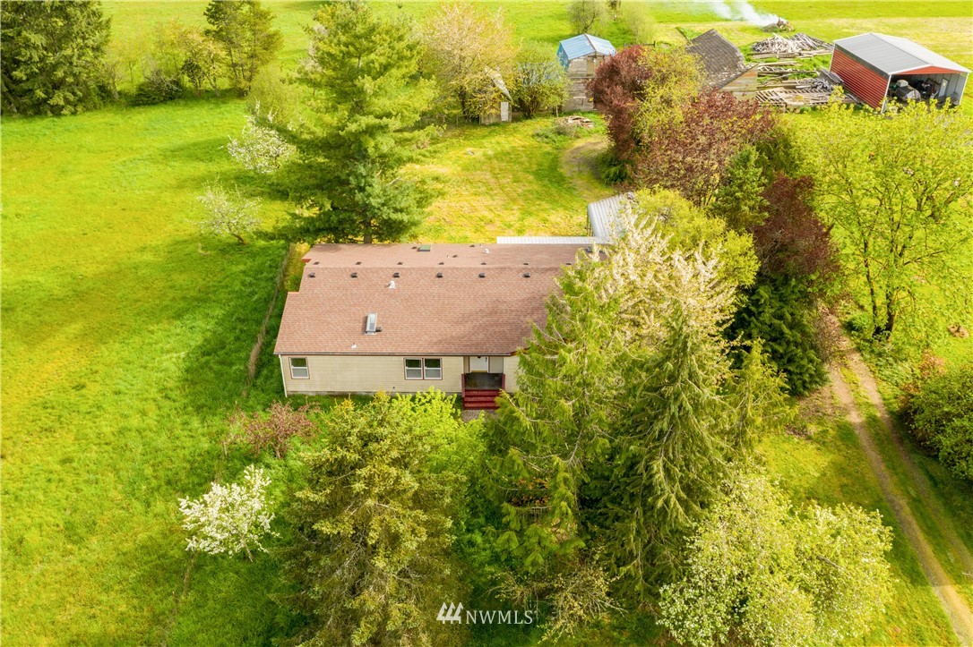 440 Kirkland Road Chehalis, WA 98532 - Photo 34 of 36 an aerial view of residential houses with outdoor space and trees