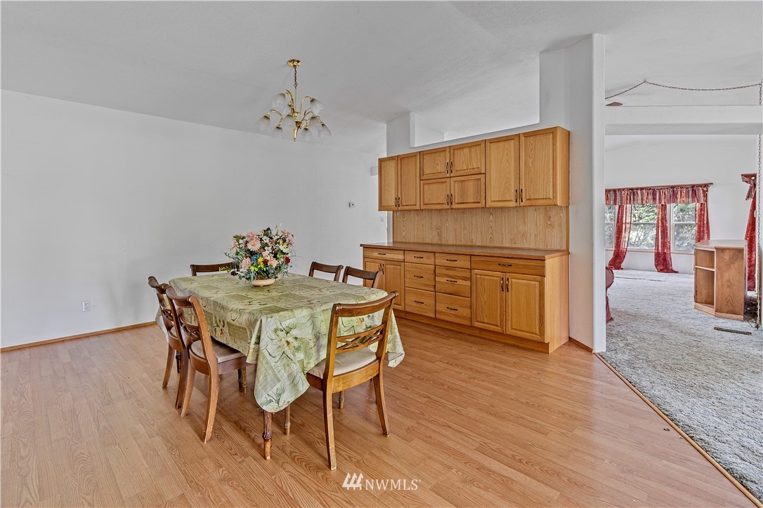 440 Kirkland Road Chehalis, WA 98532 - Photo 6 of 36 a view of a dining room with furniture and wooden floor