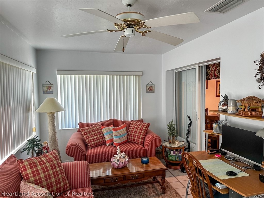 4428 Loquat Road Sebring, FL 33875 - Photo 14 of 29 a workspace with furniture and a window