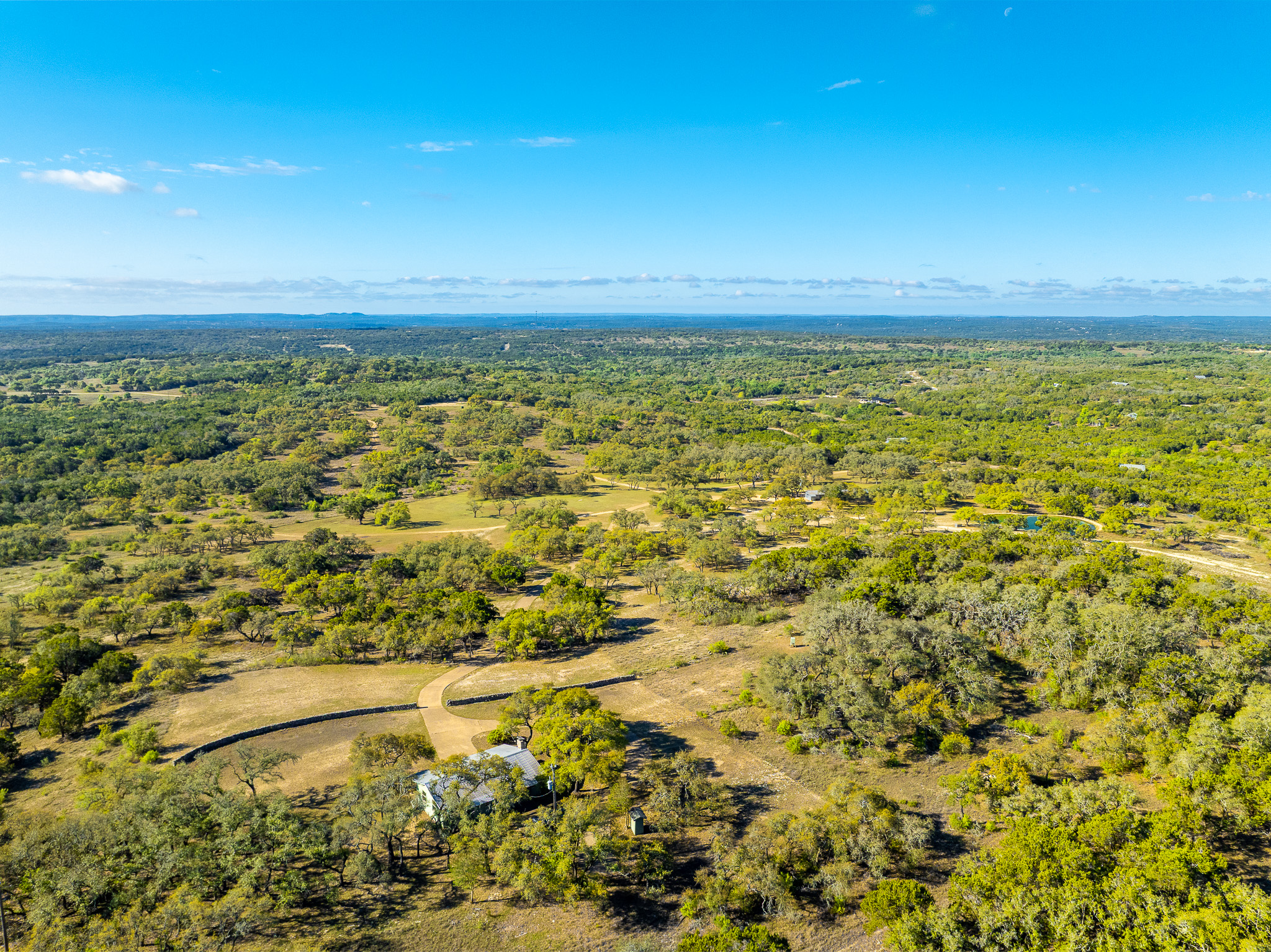 1100 Pump Station Road Wimberley, TX 78676 - Photo 11 of 40 a view of ocean with a large tree
