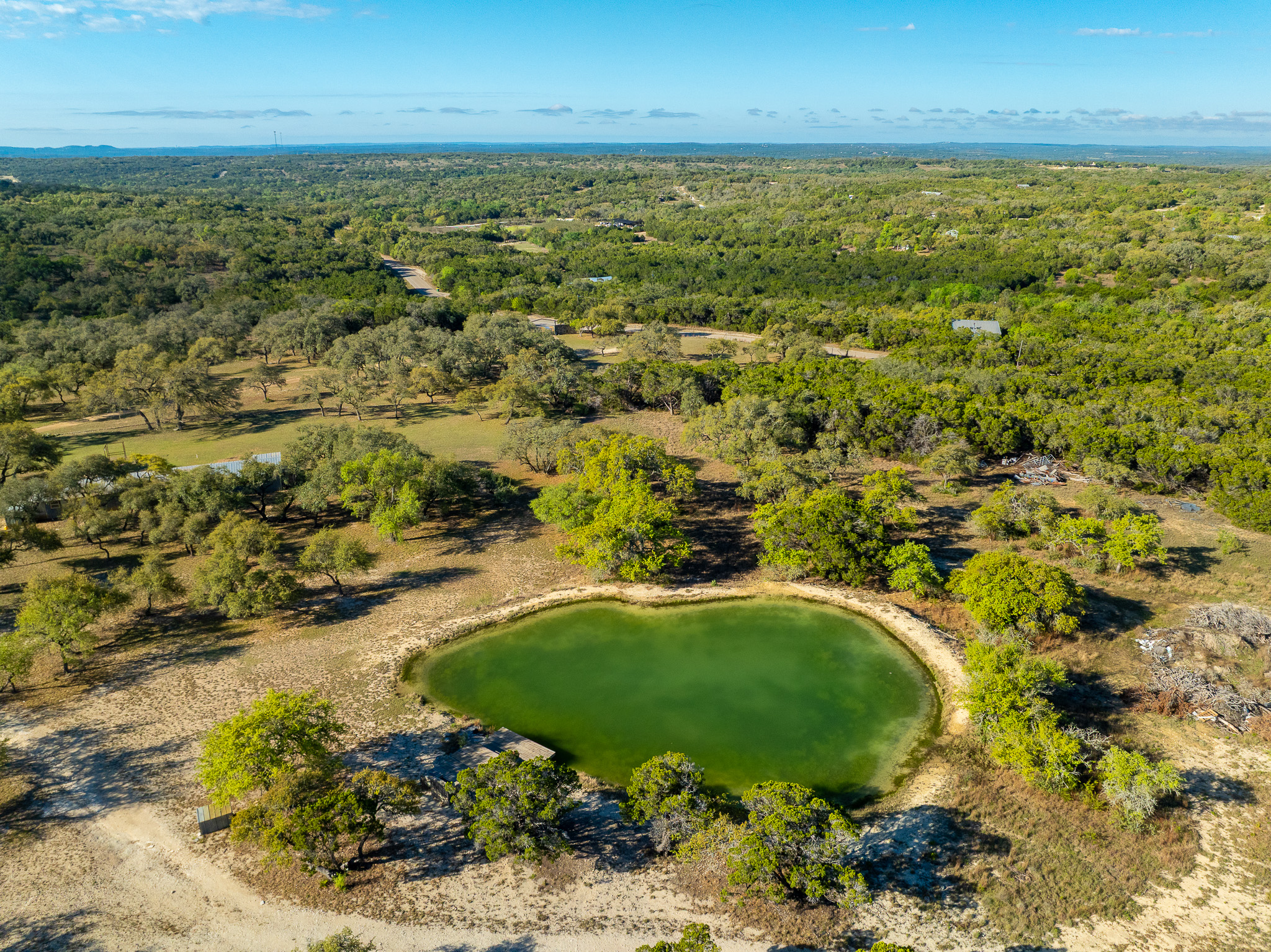 1100 Pump Station Road Wimberley, TX 78676 - Photo 13 of 40 a view of a lake with a city