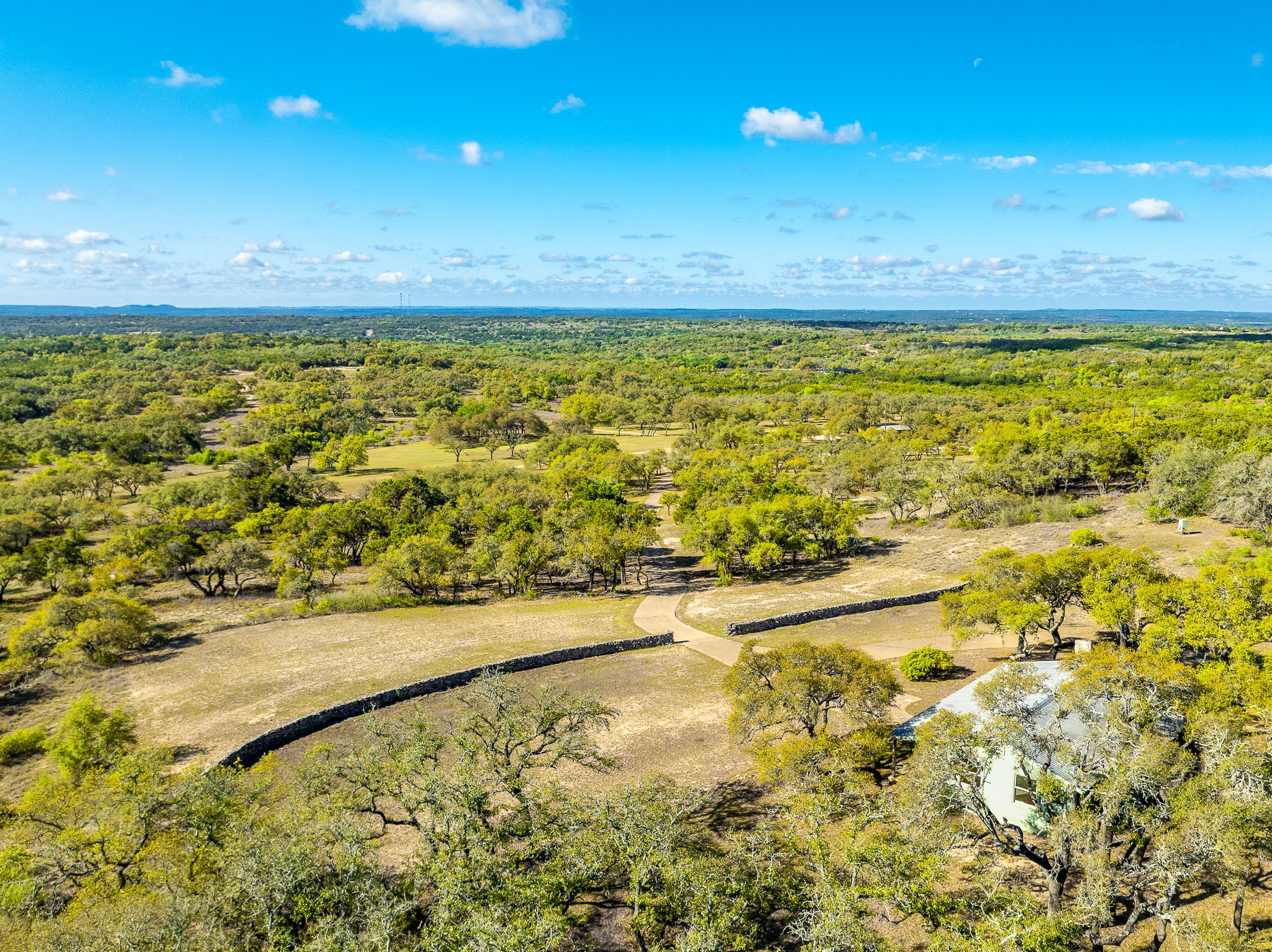 1100 Pump Station Road Wimberley, TX 78676 - Photo 9 of 40 Bird's eye view of a heavily wooded area