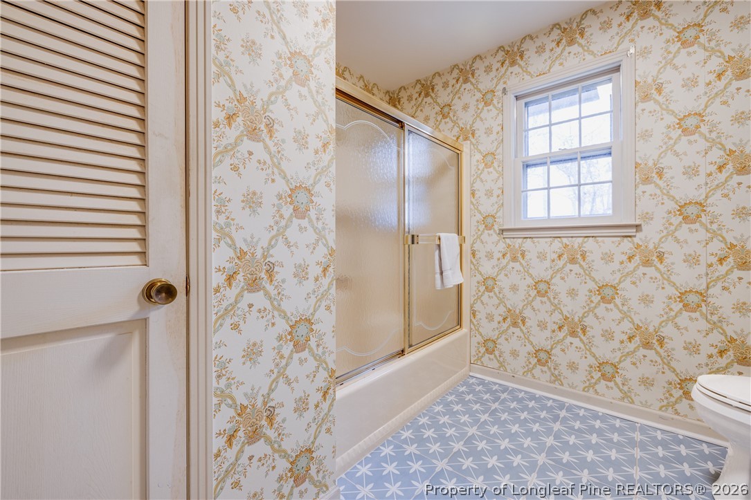 1250 Overhills Road Linden, NC 28356 - Photo 17 of 34 a bathroom with a shower and a toilet