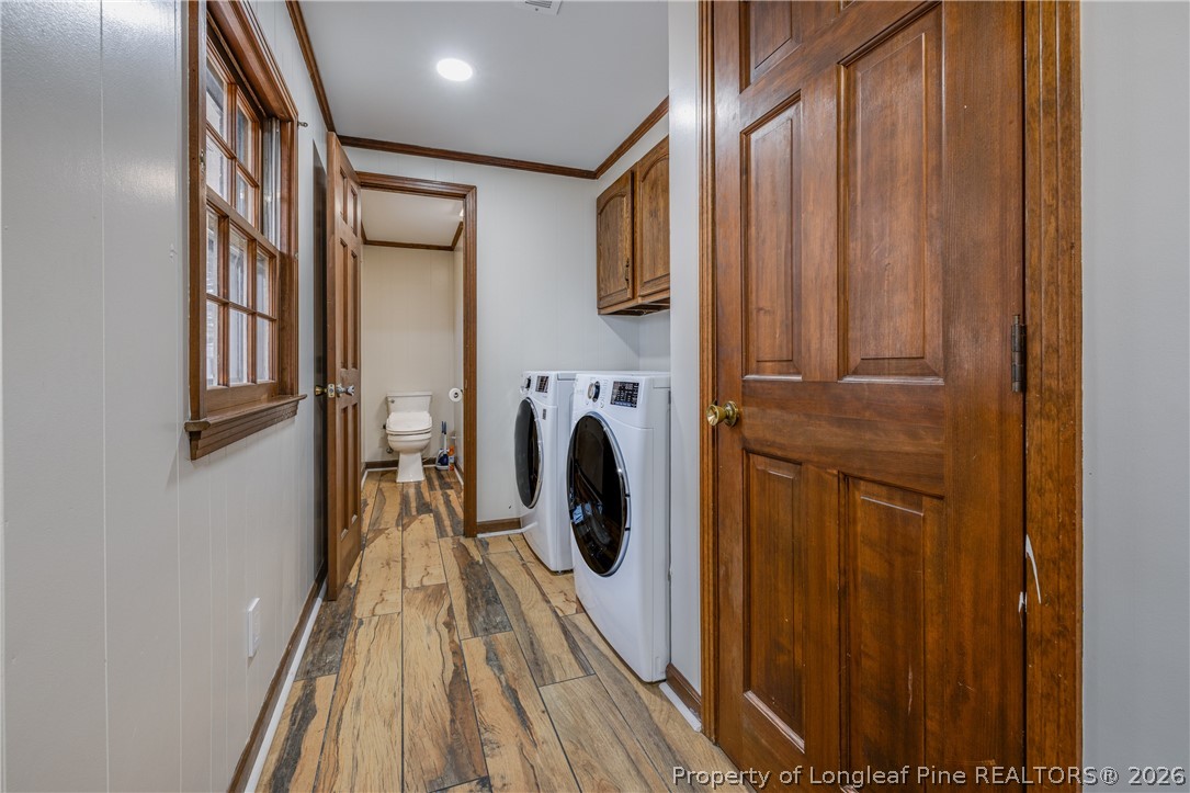 1250 Overhills Road Linden, NC 28356 - Photo 25 of 34 a view of a hallway with washer and dryer