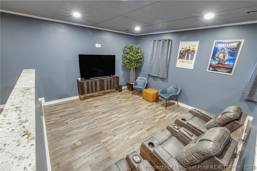 1250 Overhills Road Linden, NC 28356 - Photo 29 of 34 a bedroom with a bed and a flat screen tv