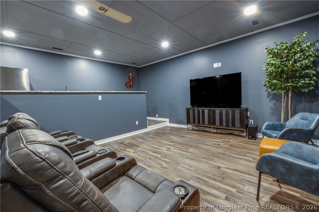 1250 Overhills Road Linden, NC 28356 - Photo 30 of 34 a living room with furniture and a flat screen tv