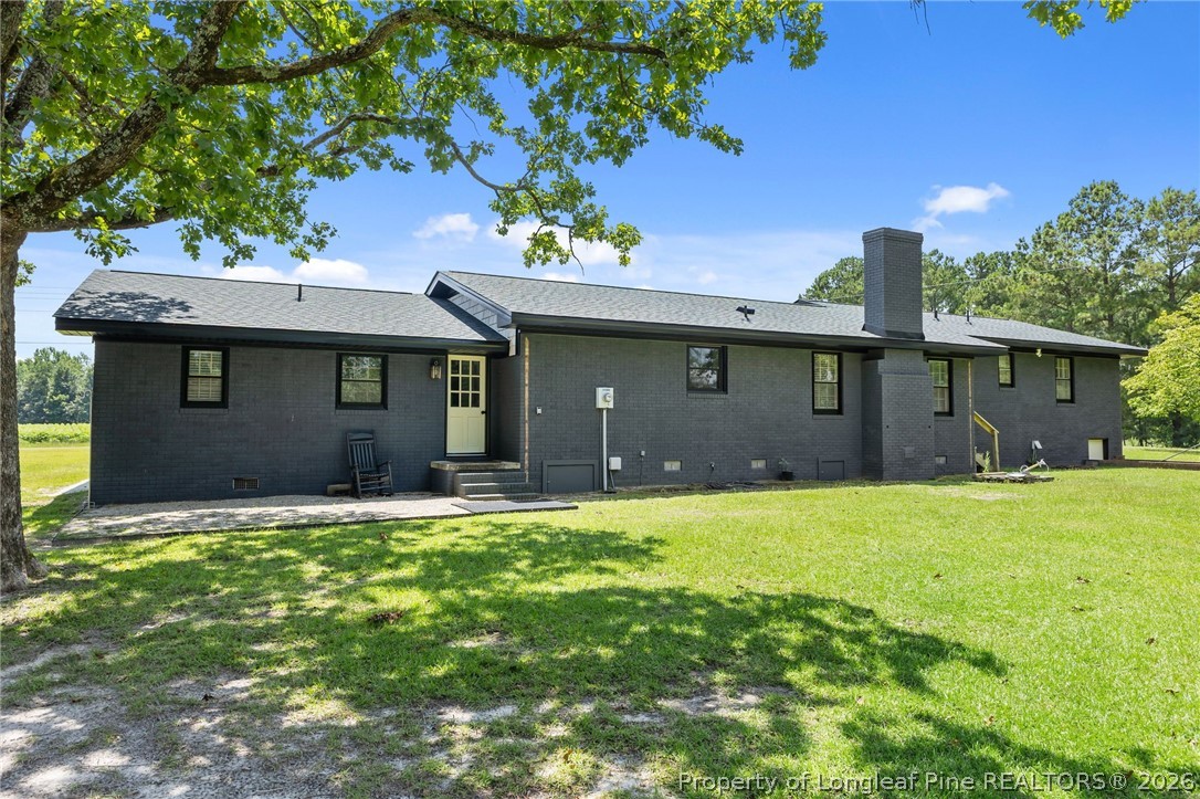 1250 Overhills Road Linden, NC 28356 - Photo 33 of 34 a front view of a house with a yard