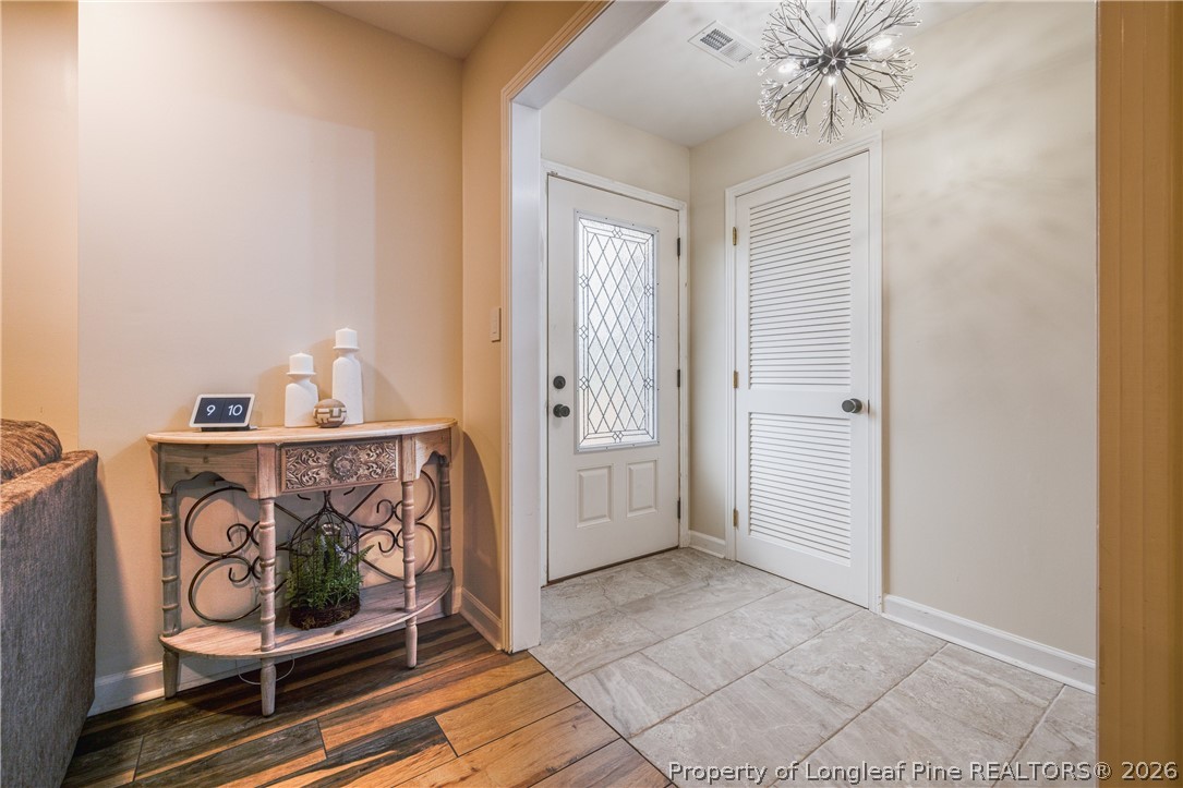 1250 Overhills Road Linden, NC 28356 - Photo 4 of 34 a view of an entryway with wooden floor