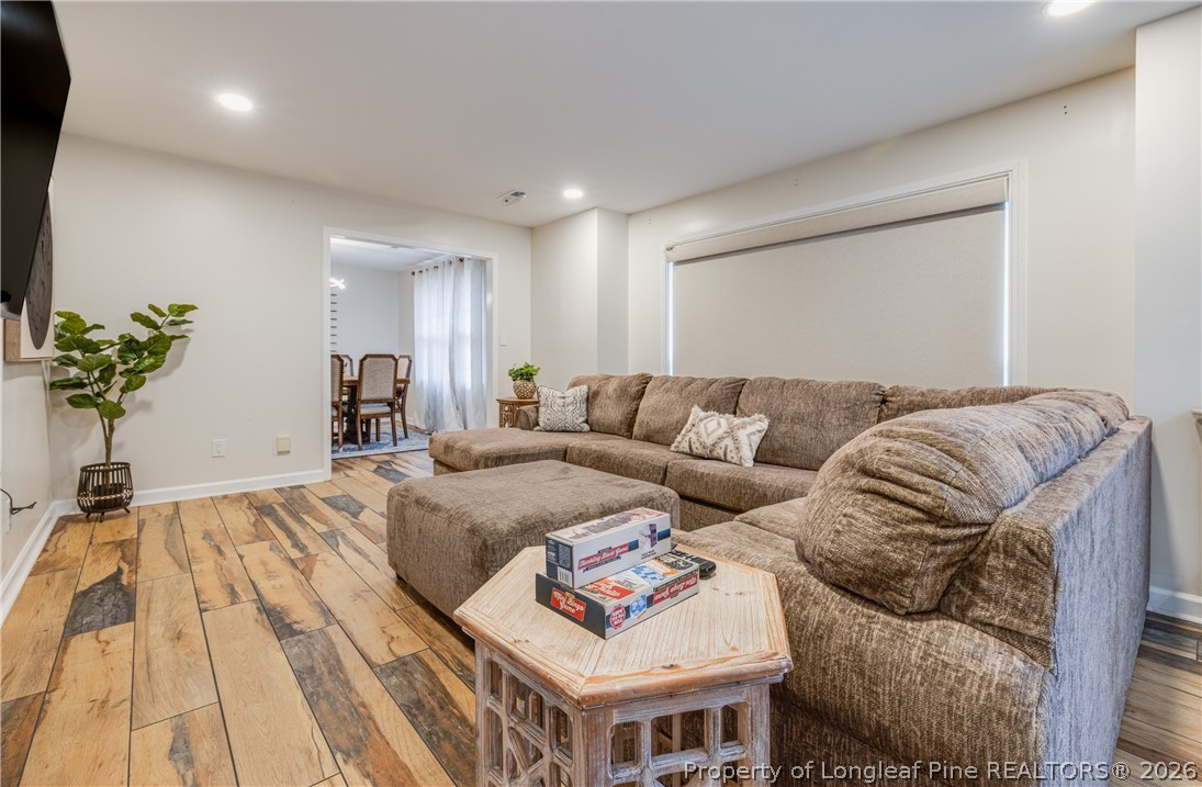 1250 Overhills Road Linden, NC 28356 - Photo 5 of 34 a bed room with a bed and a couch