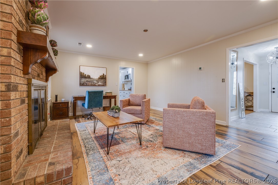 1250 Overhills Road Linden, NC 28356 - Photo 9 of 34 a living room with furniture and a rug
