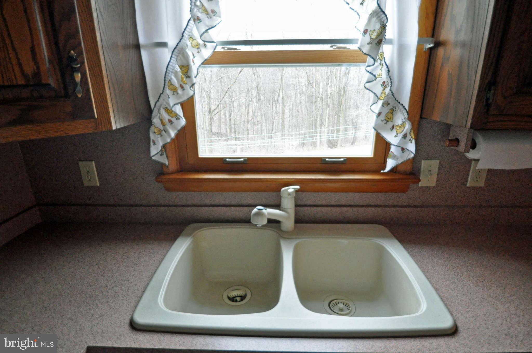 4915 Mt Zion Road Frederick, MD 21703 - Photo 13 of 30 a bathroom with a sink and a window