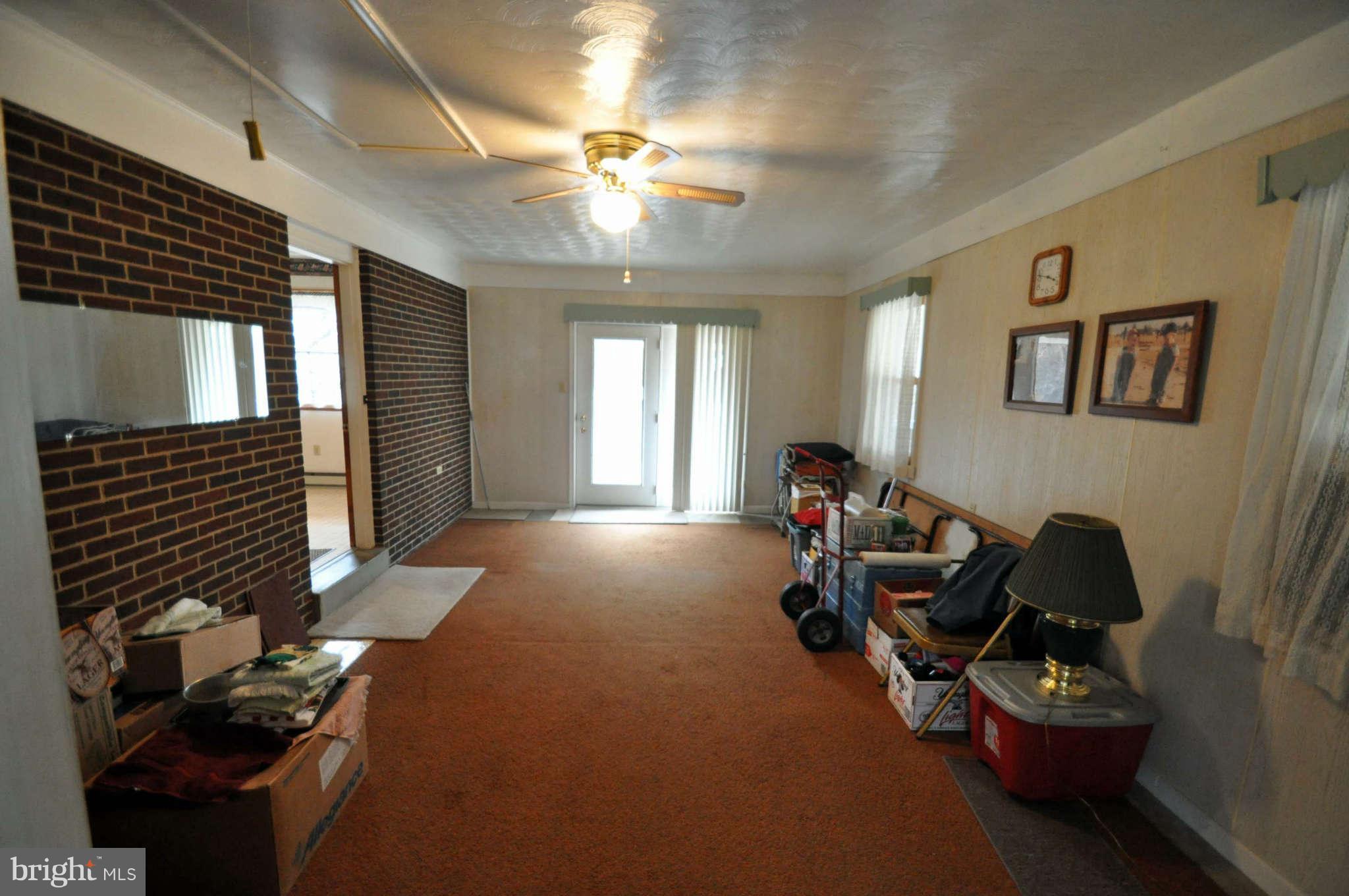 4915 Mt Zion Road Frederick, MD 21703 - Photo 17 of 30 a room with furniture and windows