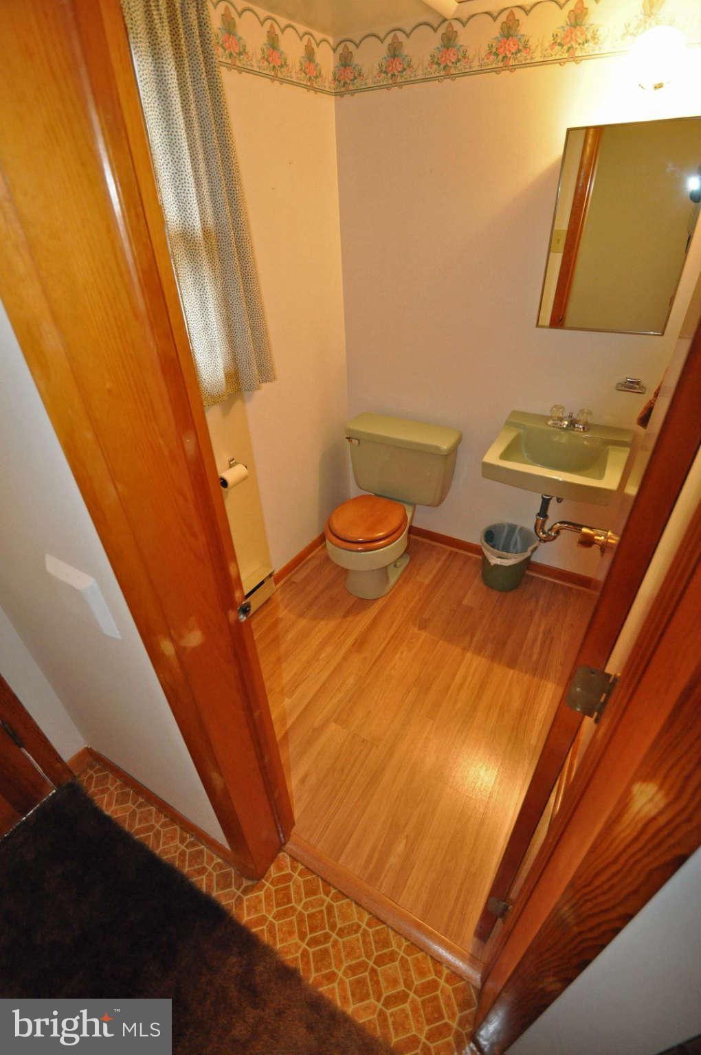 4915 Mt Zion Road Frederick, MD 21703 - Photo 23 of 30 a bathroom with a sink and a mirror