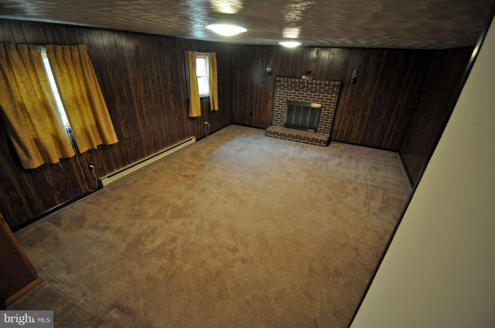 4915 Mt Zion Road Frederick, MD 21703 - Photo 24 of 30 a view of an empty room with a fireplace