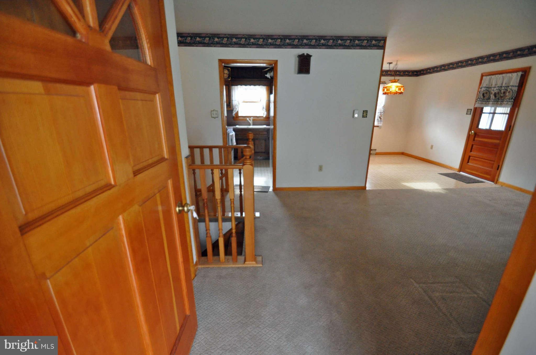 4915 Mt Zion Road Frederick, MD 21703 - Photo 10 of 30 a view of a hallway with wooden shelves