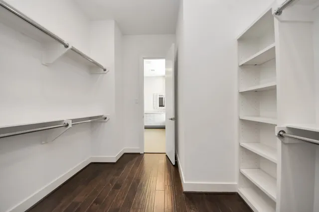 a view of a bathroom with a glass shower door