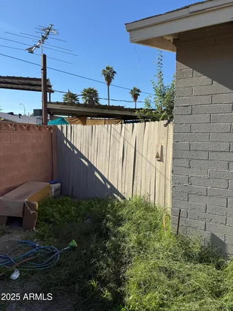 a view of a garden from a balcony
