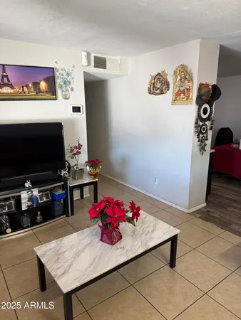 a view of a workspace with furniture