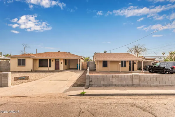 a front view of a house with a porch