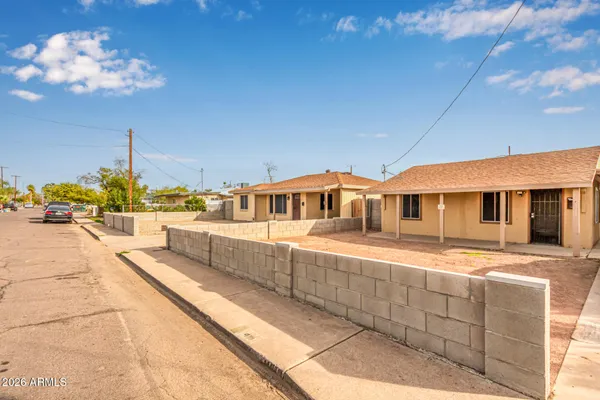 a front view of a house with a ocean view