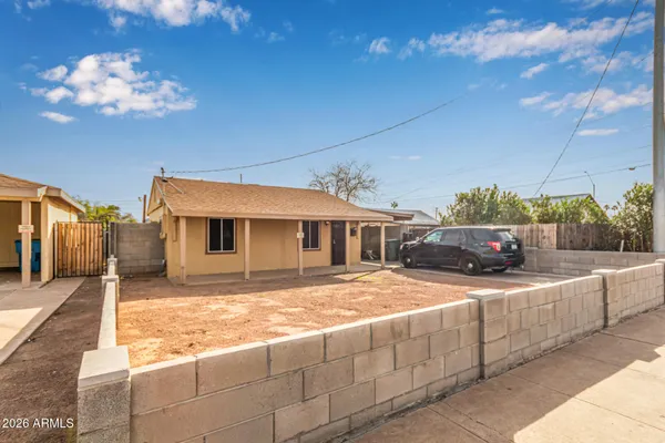 a view of a house with a patio