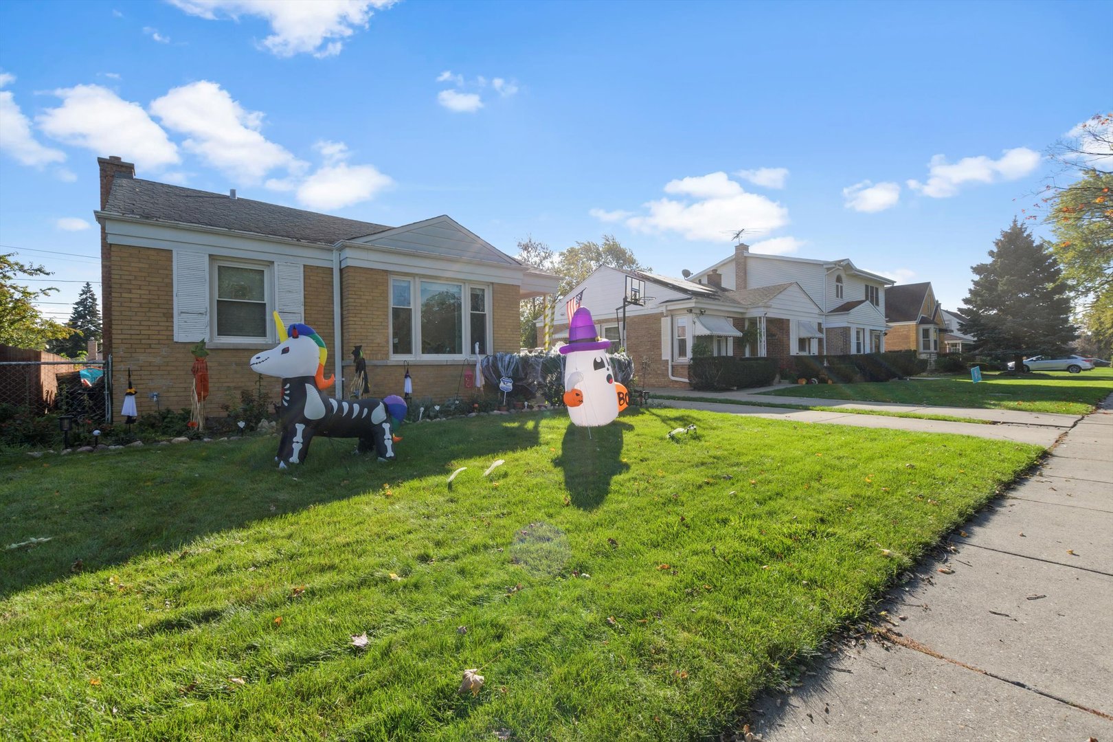 8151 Washington Street Niles, IL 60714 - Photo 1 of 18 a view of a house with a backyard porch and sitting area