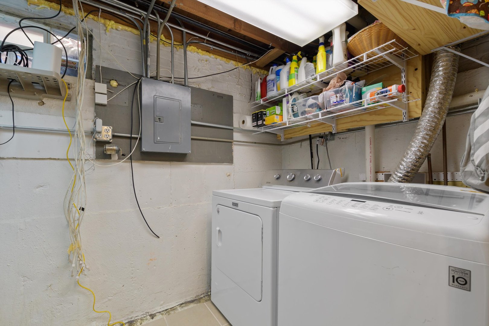 8151 Washington Street Niles, IL 60714 - Photo 16 of 18 a utility room with cabinets