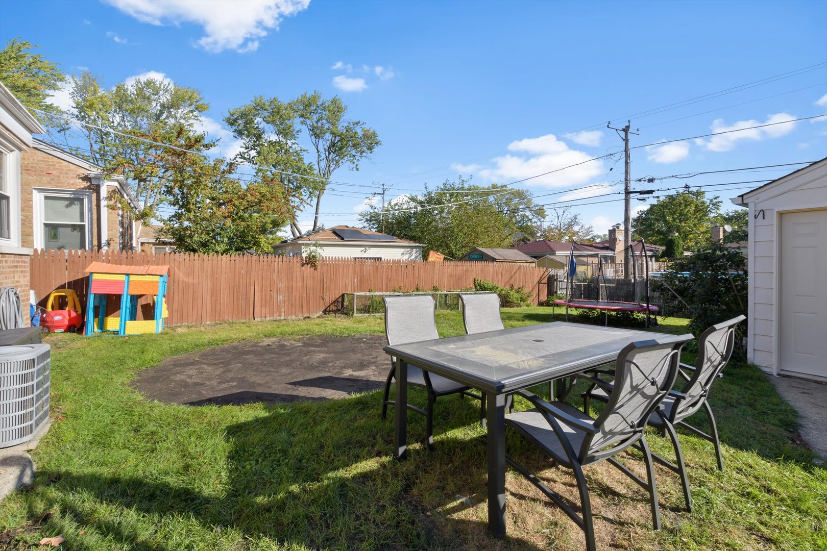 8151 Washington Street Niles, IL 60714 - Photo 17 of 18 a view of a table and chairs in patio