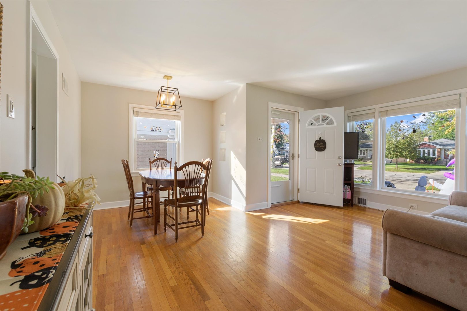 8151 Washington Street Niles, IL 60714 - Photo 3 of 18 a view of a dining room with furniture window and outside view