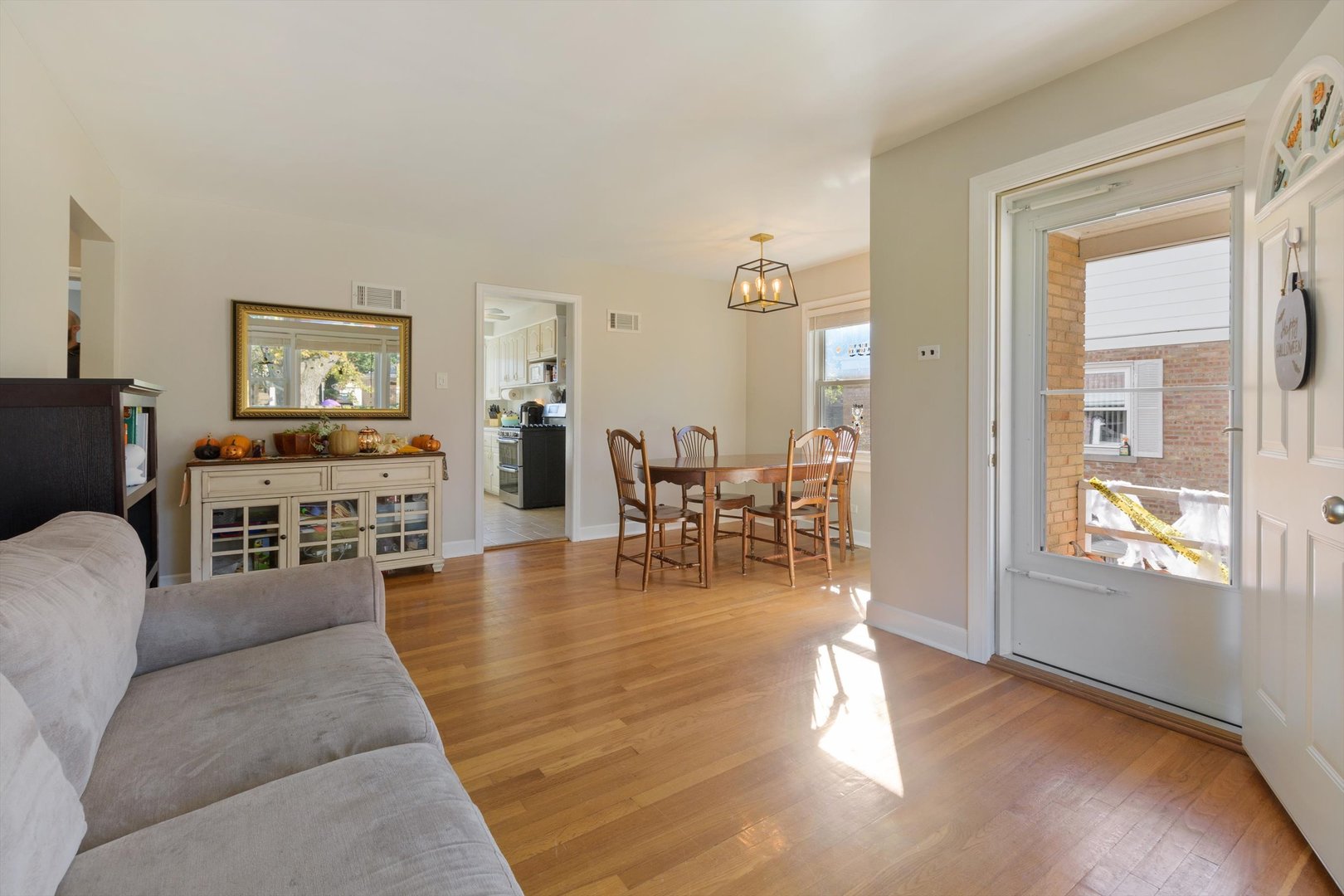 8151 Washington Street Niles, IL 60714 - Photo 4 of 18 a living room with furniture and wooden floor