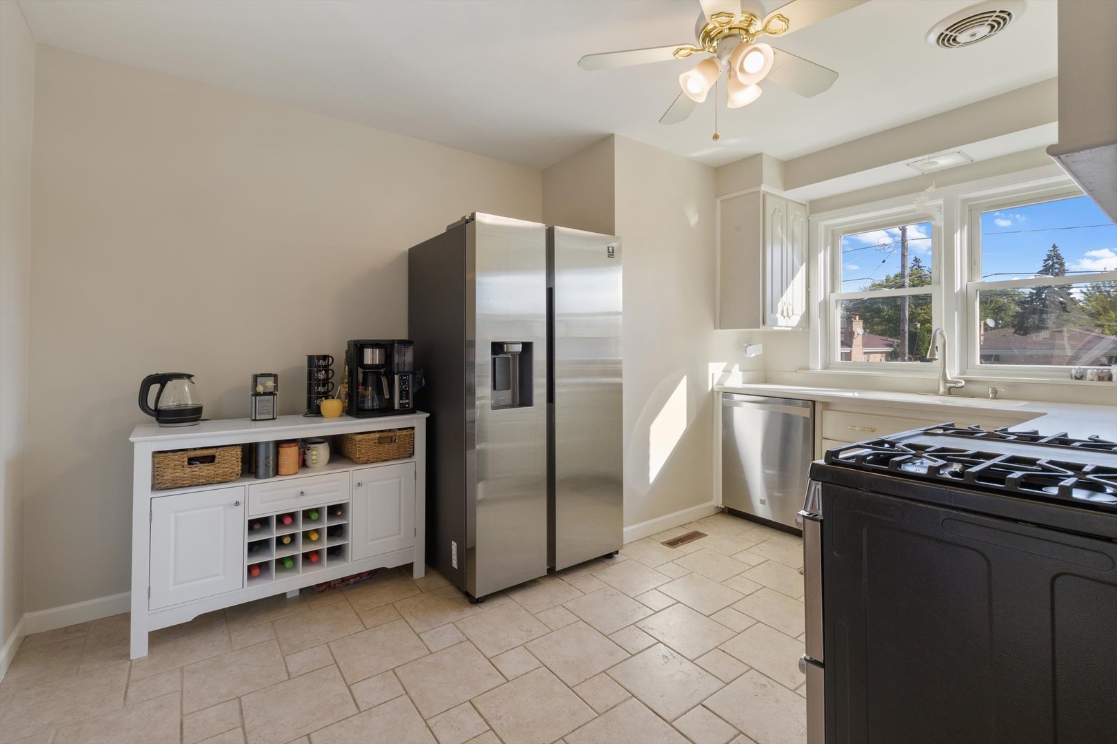 8151 Washington Street Niles, IL 60714 - Photo 6 of 18 a kitchen with cabinets and steel stainless steel appliances