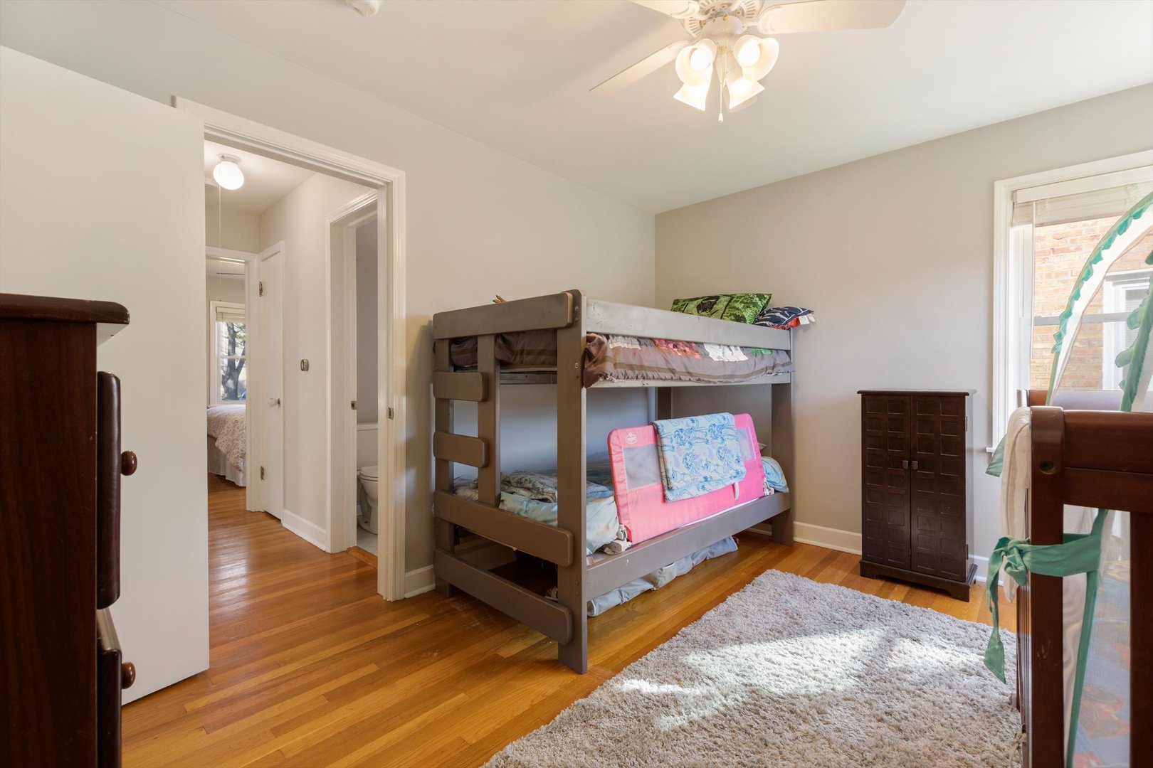 8151 Washington Street Niles, IL 60714 - Photo 10 of 18 a bedroom with furniture and a window